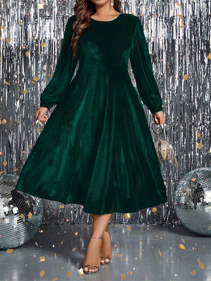 Vestido de veludo  com cintura marcada, manga comprida, gola redonda.