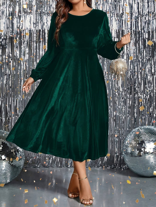 Vestido de veludo  com cintura marcada, manga comprida, gola redonda.