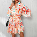 Vestido curto estilo boho com estampa tribal.